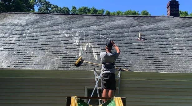Before and after results of roof washing by Strongsville Power Washing in Strongsville